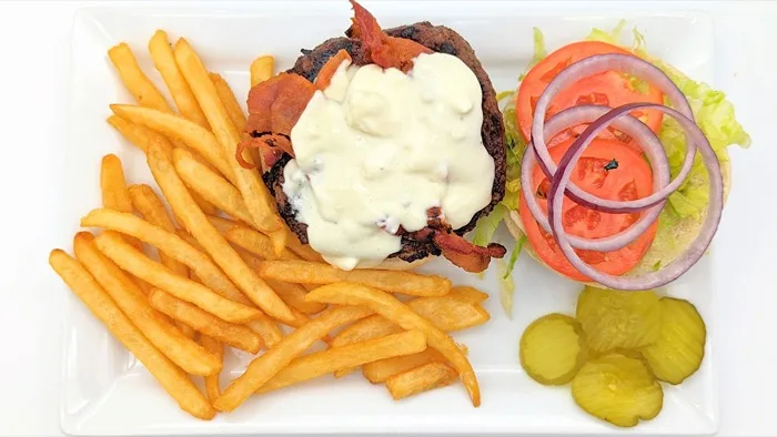 Classic cheeseburger and fries at Venus III